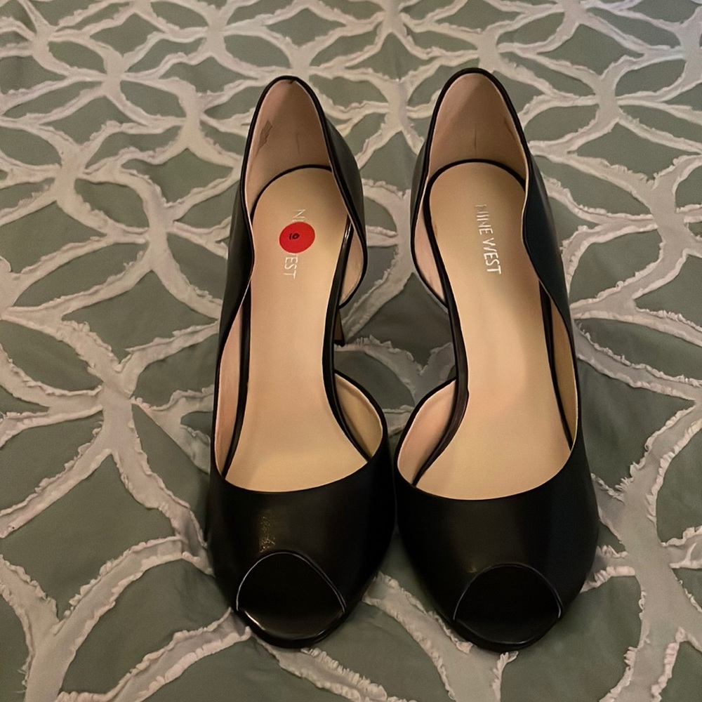 Black 3 1/2 inch heel. Nine West. Open toe.